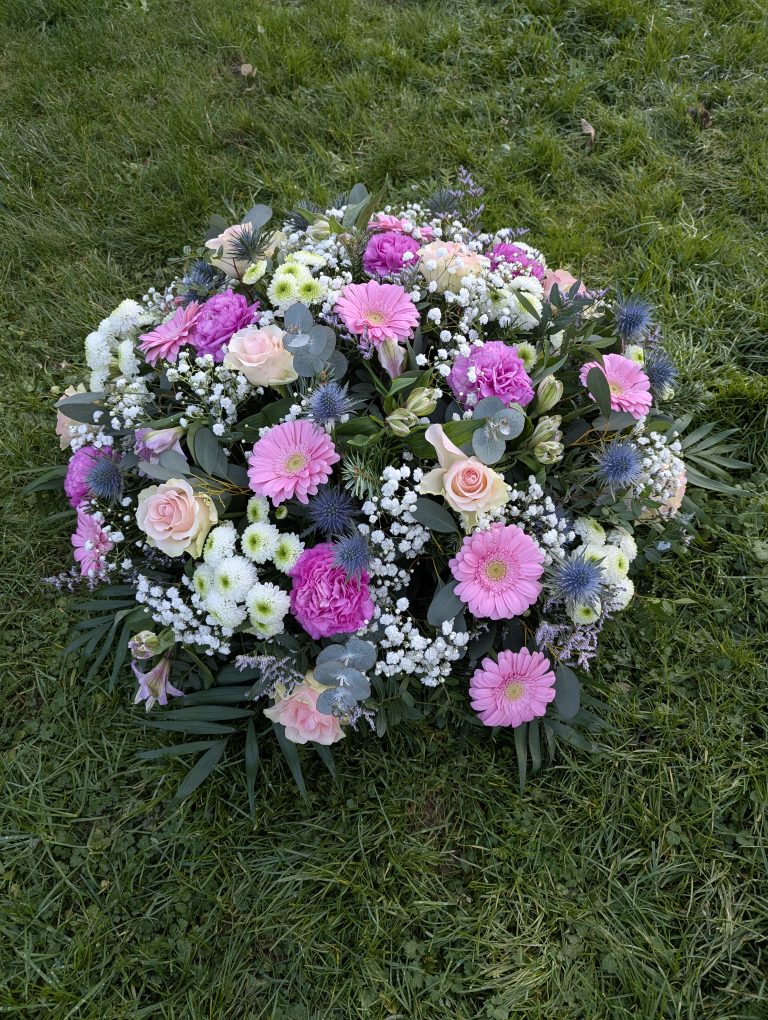 coussin deuil rond rose